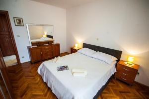 Posteľ alebo postele v izbe v ubytovaní La Mia Apartment