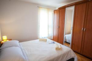 Posteľ alebo postele v izbe v ubytovaní La Mia Apartment