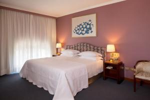Postel nebo postele na pokoji v ubytování Starhotels Du Parc
