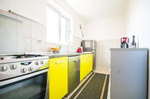 Kuchyňa alebo kuchynka v ubytovaní La Mia Apartment