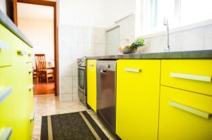 Kuchyňa alebo kuchynka v ubytovaní La Mia Apartment