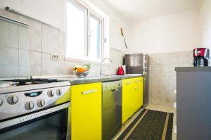 Kuchyňa alebo kuchynka v ubytovaní La Mia Apartment