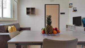 a bowl of fruit on a table in a living room at Case Vacanza Marzano in Monopoli