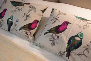 Una cama o camas en una habitación de Douce Nuits