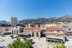 an aerial view of a city with buildings at Grand Hôtel de la Gare Toulon - Boutique Hôtel in Toulon