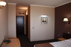 Postel nebo postele na pokoji v ubytování Guest House Palazzo
