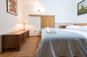 Postel nebo postele na pokoji v ubytování Villa Bruna