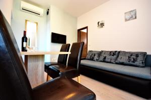 Posezení v ubytování Apartments Clara