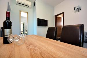 TV a/nebo společenská místnost v ubytování Apartments Clara