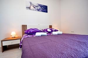 Postel nebo postele na pokoji v ubytování Apartments Clara