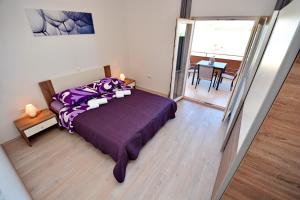 Postel nebo postele na pokoji v ubytování Apartments Clara