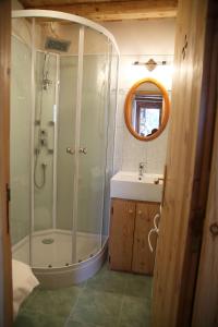 a bathroom with a shower and a sink at A La Pastourelle in Bonneval-sur-Arc