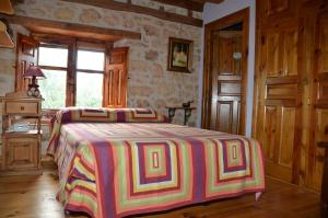 Postel nebo postele na pokoji v ubytování Casa Rural El Covanchón