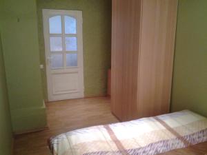 Postel nebo postele na pokoji v ubytování Jaani 2-1 Apartment