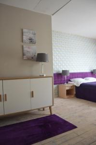 Postel nebo postele na pokoji v ubytování B&B Landrynka