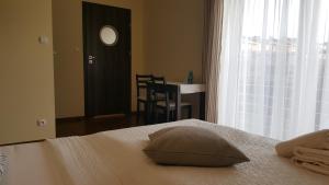 Postel nebo postele na pokoji v ubytování Pokoje U Beaty