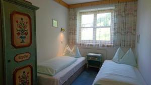 Postel nebo postele na pokoji v ubytování Appartementhotel Hechenberg