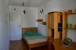 Кровать или кровати в номере Sweet home in Ljubljana