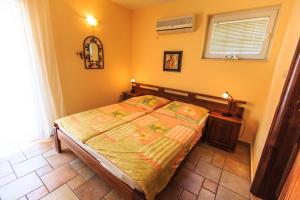 Postel nebo postele na pokoji v ubytování daMonte – Apartments and rooms