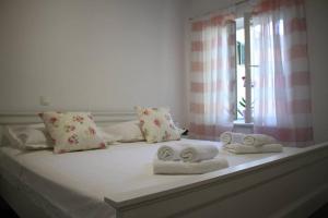 Postel nebo postele na pokoji v ubytování Apartments Holiday Baška Voda