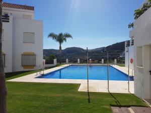 Πισίνα στο ή κοντά στο Luxury and secluded apartment set in Valle Romano