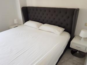 Ένα ή περισσότερα κρεβάτια σε δωμάτιο στο Luxury and secluded apartment set in Valle Romano +13 φωτογραφίες