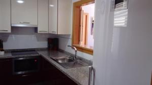 Kuchyň nebo kuchyňský kout v ubytování Apartamento Puerto Real