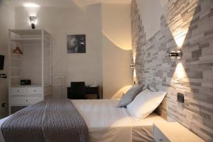 Postel nebo postele na pokoji v ubytování Aurelia Rooms