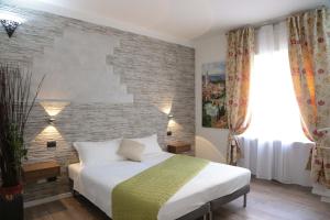 Postel nebo postele na pokoji v ubytování Aurelia Rooms