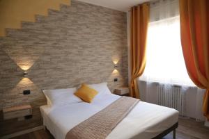 Postel nebo postele na pokoji v ubytování Aurelia Rooms