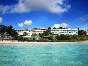 a view of a resort from the water at European Luxur Tortola 5318 in Cul de Sac