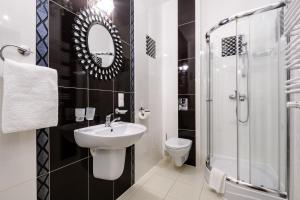 Ванная комната в Rezydencja Rodzinna