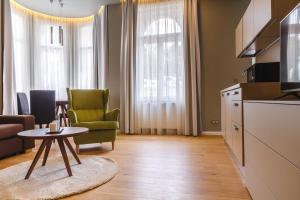Kuchyň nebo kuchyňský kout v ubytování Apartments Bohemia Rhapsody
