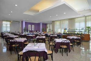 Ресторант или друго място за хранене в Hotel Olimpia