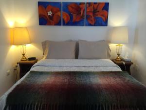 Ένα ή περισσότερα κρεβάτια σε δωμάτιο στο Casa Molcajete