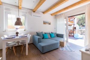 Et opholdsområde på Beach House Villa - Ap. 2