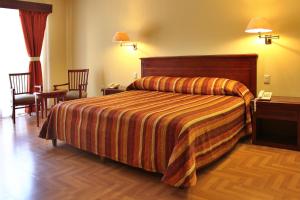Postelja oz. postelje v sobi nastanitve Hotel Casa Real Tehuacan