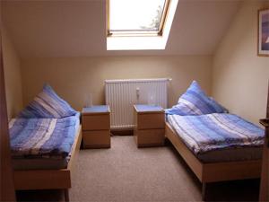 A bed or beds in a room at Apartment Jüngst