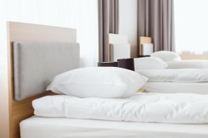 Postel nebo postele na pokoji v ubytování Waw Hotel Airport Okęcie