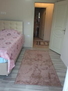 A bed or beds in a room at Gerze Apart Otel