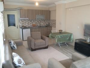 A kitchen or kitchenette at Gerze Apart Otel