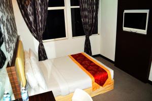 Voodi või voodid majutusasutuse Springz Hotel-Bukit Jalil toas