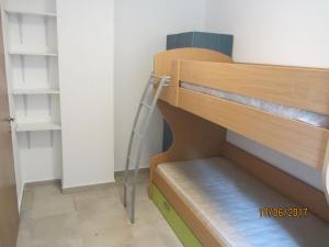 Poschodová posteľ alebo postele v izbe v ubytovaní Holiday Home Idyllic Cottage