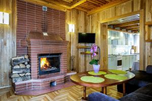 TV a/nebo společenská místnost v ubytování Forest Cottage