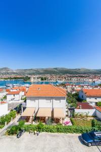 an aerial view of a white building with an orange roof at Rooms Carija in Trogir