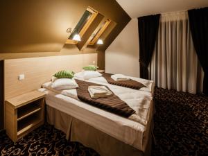 Ένα ή περισσότερα κρεβάτια σε δωμάτιο στο Zana Vaii