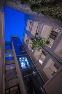 a view of a building with blue lights at Hotel Riva by Aycon in Petrovac na Moru