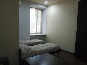 Ένα ή περισσότερα κρεβάτια σε δωμάτιο στο Apartment Paronyan 22