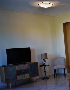 TV a/nebo společenská místnost v ubytování Marilias house
