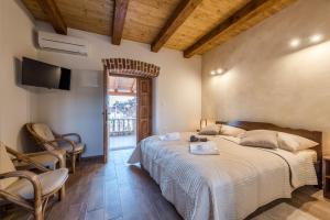 Postel nebo postele na pokoji v ubytování Villa Dumina + 37 fotografií